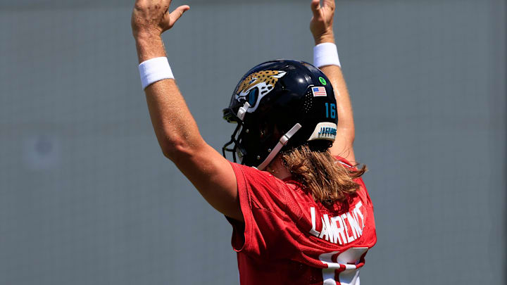 Jacksonville Jaguars quarterback Trevor Lawrence (16) signals a touchdown during an NFL training camp session at the Miller Electric Center, Friday Aug. 15, 2025 in Jacksonville, Fla. [Corey Perrine/Florida Times-Union]