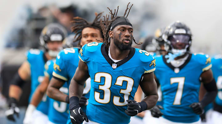 Jacksonville Jaguars linebacker Devin Lloyd (33) runs on the field before an NFL football matchup Sunday, Dec. 15, 2024 at EverBank Stadium in Jacksonville, Fla. [Corey Perrine/Florida Times-Union]