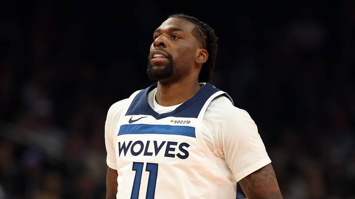 Nov 21, 2025; Phoenix, Arizona, USA; Minnesota Timberwolves center Naz Reid (11) against the Phoenix Suns during an NBA Cup game at Mortgage Matchup Center. Mandatory Credit: Mark J. Rebilas-Imagn Images