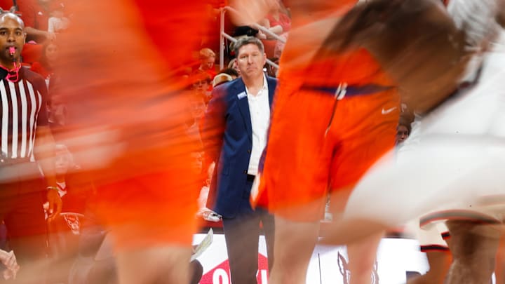 Feb 1, 2025; Raleigh, North Carolina, USA; (editors note: in camera motionblur) Clemson Tigers head coach Brad Brownell looks on during the second half of the game against the North Carolina State Wolfpack at Lenovo Center. Mandatory Credit: Jaylynn Nash-Imagn Images