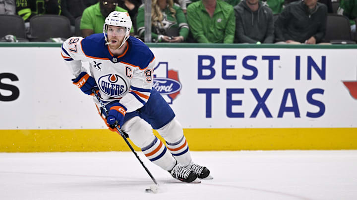 May 23, 2025; Dallas, Texas, USA; Edmonton Oilers center Connor McDavid (97) skates against the Dallas Stars during the first period in game two of the Western Conference Final of the 2025 Stanley Cup Playoffs at American Airlines Center. Mandatory Credit: Jerome Miron-Imagn Images May 23, 2025; Dallas, Texas, USA; Edmonton Oilers center Connor McDavid (97) skates against the Dallas Stars during the first period in game two of the Western Conference Final of the 2025 Stanley Cup Playoffs at American Airlines Center. Mandatory Credit: Jerome Miron-Imagn Images