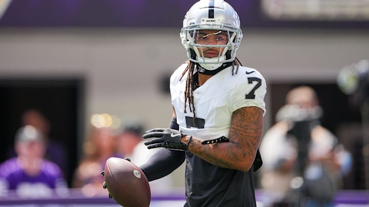 Aug 10, 2024; Minneapolis, Minnesota, USA; Las Vegas Raiders safety Tre'von Moehrig (7) warms up before the game against the Minnesota Vikings  at U.S. Bank Stadium. Mandatory Credit: Brad Rempel-Imagn Images