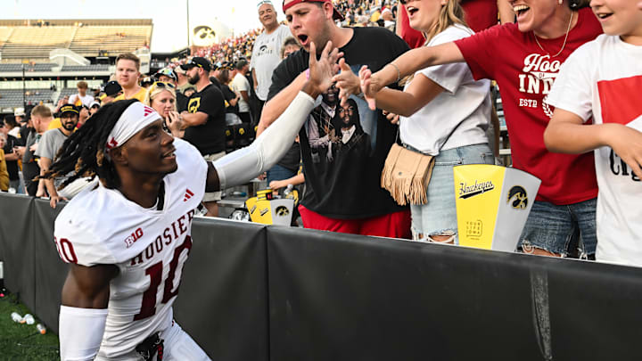 Indiana defensive back Ryland Gandy celebrates with fans after beating Iowa on Saturday at Kinnick Stadium. Indiana defensive back Ryland Gandy celebrates with fans after beating Iowa on Saturday at Kinnick Stadium.