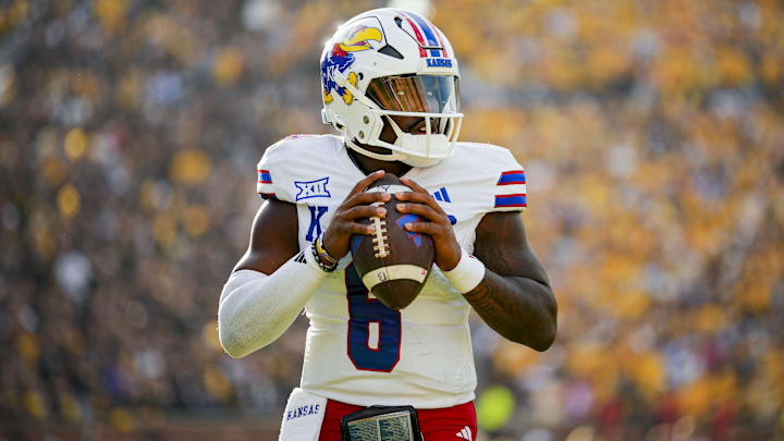 Sep 6, 2025; Columbia, Missouri, USA; Kansas Jayhawks quarterback Jalon Daniels (6) warms up during the second half against the Missouri Tigers at Faurot Field at Memorial Stadium. Mandatory Credit: Jay Biggerstaff-Imagn Images Sep 6, 2025; Columbia, Missouri, USA; Kansas Jayhawks quarterback Jalon Daniels (6) warms up during the second half against the Missouri Tigers at Faurot Field at Memorial Stadium. Mandatory Credit: Jay Biggerstaff-Imagn Images