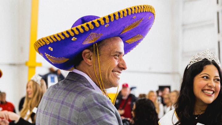Jedd Fisch dons the local apparel after he and the Huskies arrived in El Paso, Texas, for the Sun Bowl. Jedd Fisch dons the local apparel after he and the Huskies arrived in El Paso, Texas, for the Sun Bowl.