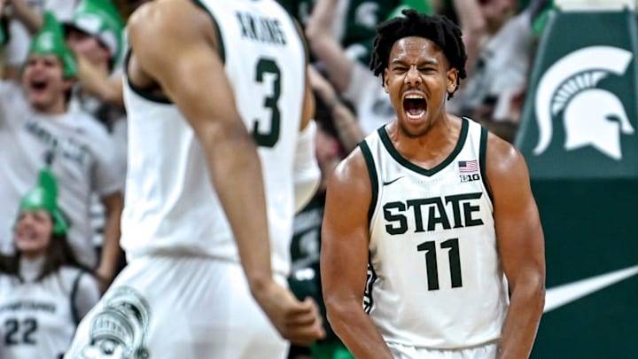 Michigan State's A.J. Hoggard, right, celebrates with Jaden Akins after Akins' 3-pointer against