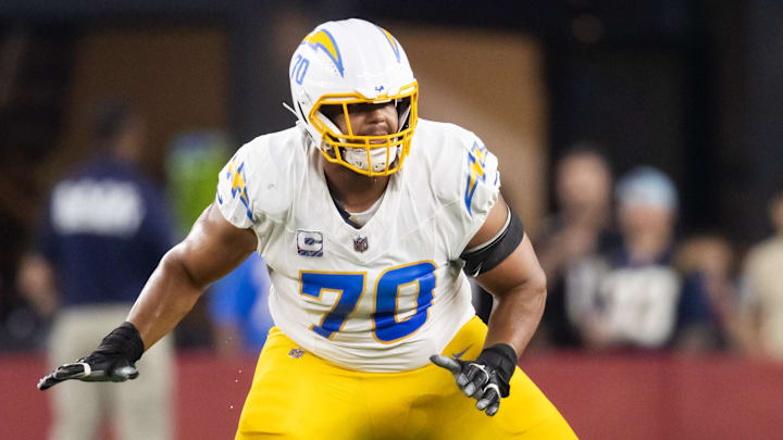 Oct 21, 2024; Glendale, Arizona, USA; Los Angeles Chargers offensive tackle Rashawn Slater (70) against the Arizona Cardinals at State Farm Stadium. Mandatory Credit: Mark J. Rebilas-Imagn Images