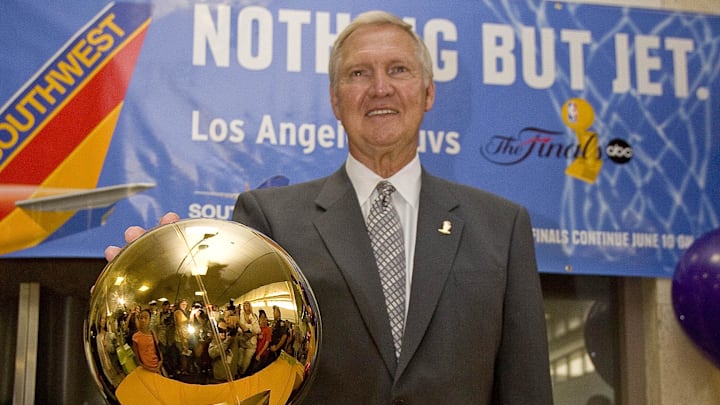 June 9, 2008; Los Angeles, CA, USA; NBA legend and former Los Angeles Lakers general manager Jerry West arrives with the Larry O'Brien NBA Championship Trophy at the Los Angeles International Airport in Los Angeles, CA. Mandatory Credit: Kyle Terada-Imagn Images