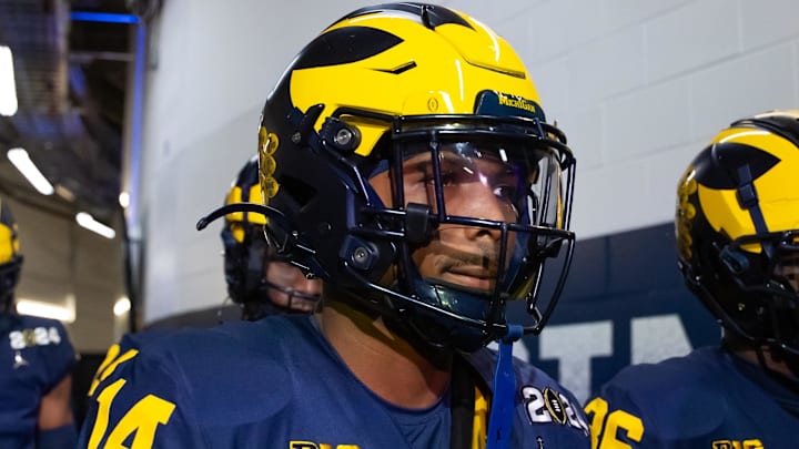 Jan 8, 2024; Houston, TX, USA; Michigan Wolverines defensive back Kody Jones (14) against the Washington Huskies during the 2024 College Football Playoff national championship game at NRG Stadium. Mandatory Credit: Mark J. Rebilas-Imagn Images