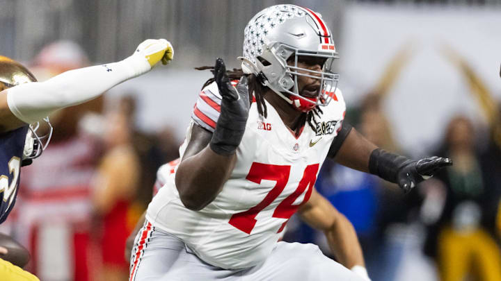 Jan 20, 2025; Atlanta, GA, USA; Ohio State Buckeyes offensive lineman Donovan Jackson (74) against the Notre Dame Fighting Irish during the CFP National Championship college football game at Mercedes-Benz Stadium. Mandatory Credit: Mark J. Rebilas-Imagn Images