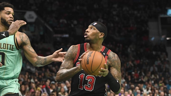 Dec 30, 2024; Charlotte, North Carolina, USA; Chicago Bulls forward Torrey Craig (13) looks to shoot during the second half against the Charlotte Hornets at the Spectrum Center. Mandatory Credit: Sam Sharpe-Imagn Images Dec 30, 2024; Charlotte, North Carolina, USA; Chicago Bulls forward Torrey Craig (13) looks to shoot during the second half against the Charlotte Hornets at the Spectrum Center. Mandatory Credit: Sam Sharpe-Imagn Images