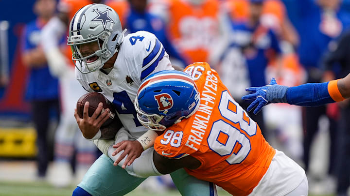 October 26, 2025: Dallas Cowboys quarterback Dak Prescott (4) is sacked by Denver Broncos defensive end John Franklin-Myers (98) win the first half of the football game between the Denver Broncos and Dallas Cowboys. October 26, 2025: Dallas Cowboys quarterback Dak Prescott (4) is sacked by Denver Broncos defensive end John Franklin-Myers (98) win the first half of the football game between the Denver Broncos and Dallas Cowboys.