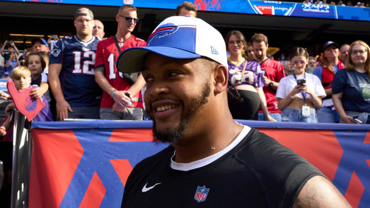 Oct 8, 2023; London, United Kingdom;  Buffalo Bills offensive tackle Dion Dawkins (73) smiles before the first half of an NFL International Series game at Tottenham Hotspur Stadium. Mandatory Credit: Peter van den Berg-USA TODAY Sports