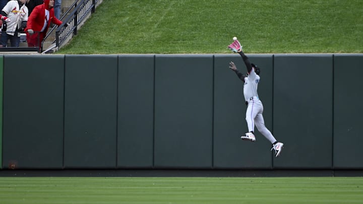Apr 4, 2024; St. Louis, Missouri, USA;  Miami Marlins center fielder Jazz Chisholm Jr. (2) leaps at