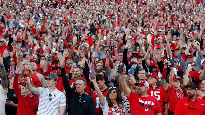 Georgia fans light up Sanford Stadium as the game heads into the forth during the second half of a NCAA college football game against Missouri in Athens, Ga., on Saturday, Nov. 4, 2023. Georgia won 30-21.