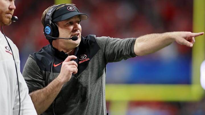 Dec 31, 2022; Atlanta, Georgia, USA; Georgia Bulldogs head coach Kirby Smart gestures against the Ohio State Buckeyes during the third quarter of the 2022 Peach Bowl at Mercedes-Benz Stadium. Mandatory Credit: Brett Davis-Imagn Images