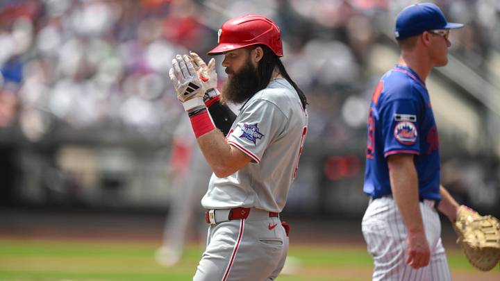 Jun 28, 2026; New York City, New York, USA; Philadelphia Phillies left fielder Brandon Marsh (16) reacts after hitting a RBI single against the New York Mets during the third inning at Citi Field.