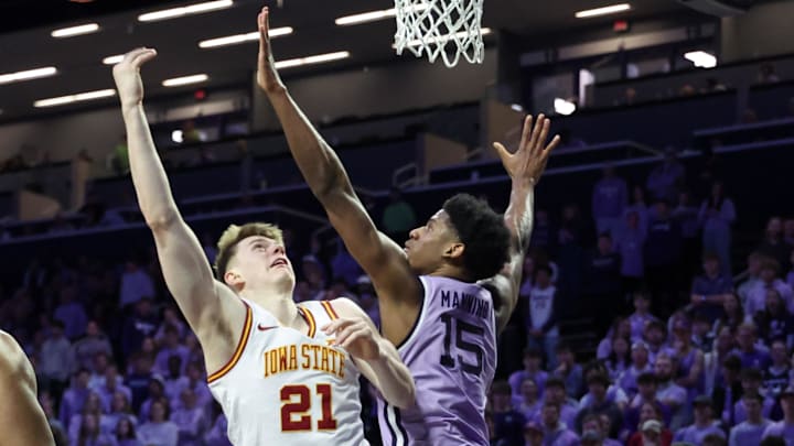 Feb 1, 2026; Manhattan, Kansas, USA; Iowa State Cyclones forward Dominykas Pleta (21) shoots against Kansas State Wildcats forward Taj Manning (15) during the second half at Bramlage Coliseum.