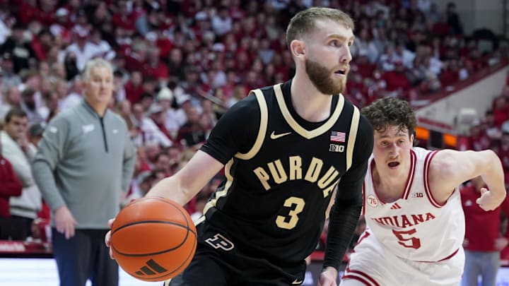 Purdue Boilermakers guard Braden Smith (3) dribbles the ball past Indiana Hoosiers guard Conor Enright (5).