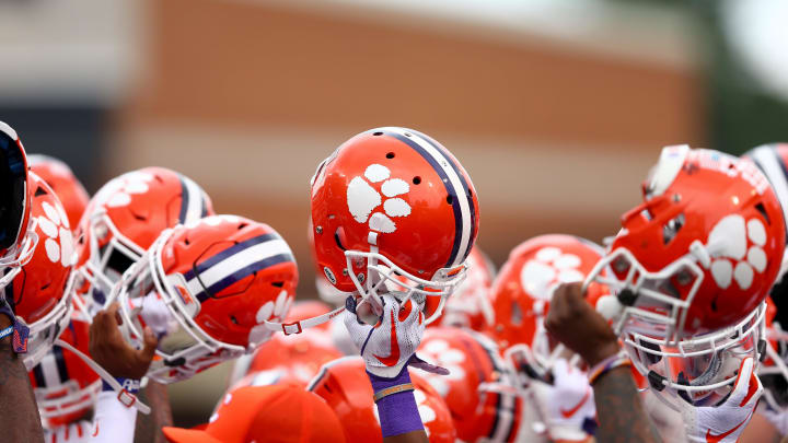 Oct 6, 2018; Winston-Salem, NC, USA; Clemson Tigers players raise their helmets prior to the game against the Wake Forest Demon Deacons at BB&T Field.