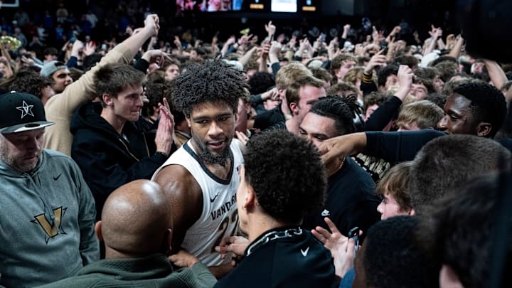 Vanderbilt Commodores forward Jaylen Carey (22) celebrates with fans after beating the Kentucky Wildcats 74-69 at Memorial Gym in Nashville, Tenn., Saturday, Jan. 25, 2025.