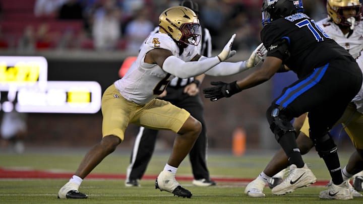 Nov 16, 2024; Dallas, Texas, USA; Boston College Eagles defensive end Donovan Ezeiruaku (6) and SMU Mustangs offensive lineman Andrew Chamblee (74) in action during the game between the SMU Mustangs and the Boston College Eagles at Gerald J. Ford Stadium. Mandatory Credit: Jerome Miron-Imagn Images