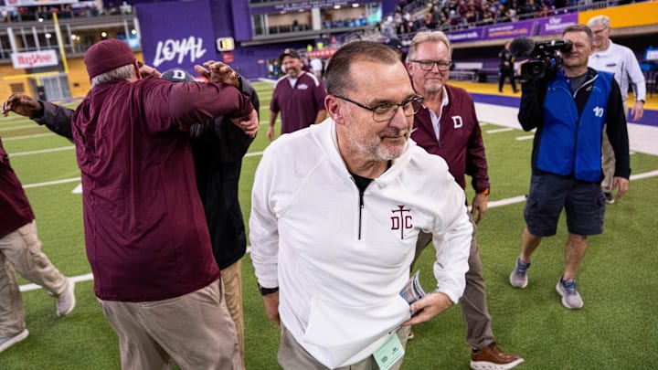 Dowling head coach Tom Wilson smiles after winning the Class 5A Iowa high school football championship on Nov. 21, 2025, at the UNI-Dome in Cedar Falls.