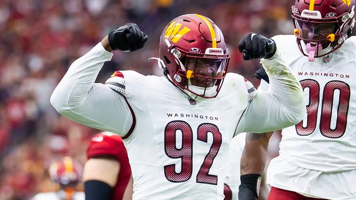 Sep 29, 2024; Glendale, Arizona, USA; Washington Commanders defensive end Dorance Armstrong (92) celebrates a sack with Javontae Jean-Baptiste (90) against the Arizona Cardinals at State Farm Stadium. Mandatory Credit: Mark J. Rebilas-Imagn Images Sep 29, 2024; Glendale, Arizona, USA; Washington Commanders defensive end Dorance Armstrong (92) celebrates a sack with Javontae Jean-Baptiste (90) against the Arizona Cardinals at State Farm Stadium. Mandatory Credit: Mark J. Rebilas-Imagn Images
