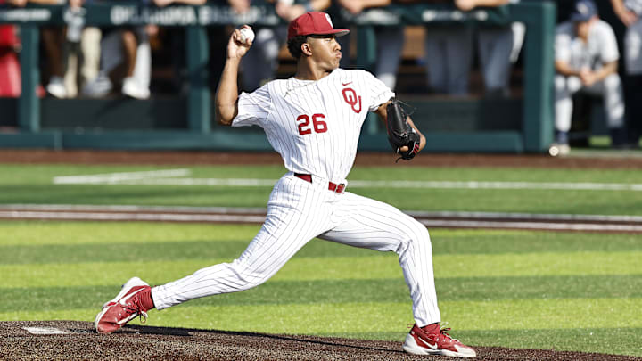 May 31, 2024; Norman, OK, USA; Oklahoma Sooners pitcher Kyson Witherspoon (26) throws a pitch during the first inning of an NCAA Division I Baseball Championship game between the Oral Roberts Golden Eagles and the Oklahoma Sooners at L. Dale Mitchell Park. Credit: Alonzo Adams-Imagn Images