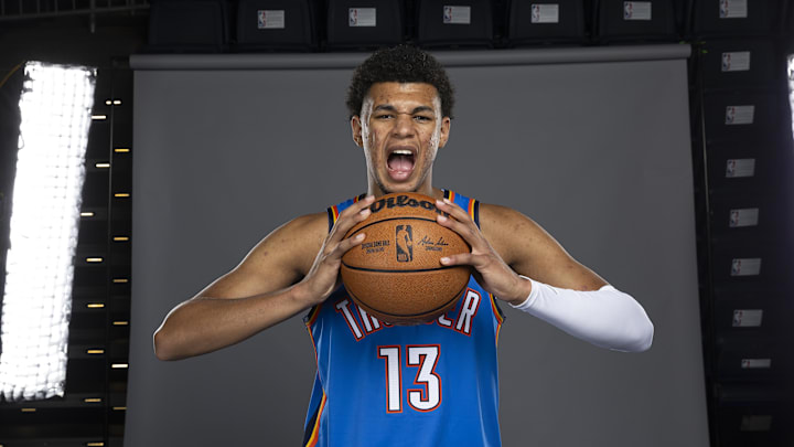 Sep 29, 2025; Oklahoma City, OK, USA; Oklahoma City Thunder forward Ousmane Dieng (13) poses for a photo during the 2025 Oklahoma City Thunder media day at Paycom Center. Mandatory Credit: Alonzo Adams-Imagn Images Sep 29, 2025; Oklahoma City, OK, USA; Oklahoma City Thunder forward Ousmane Dieng (13) poses for a photo during the 2025 Oklahoma City Thunder media day at Paycom Center. Mandatory Credit: Alonzo Adams-Imagn Images
