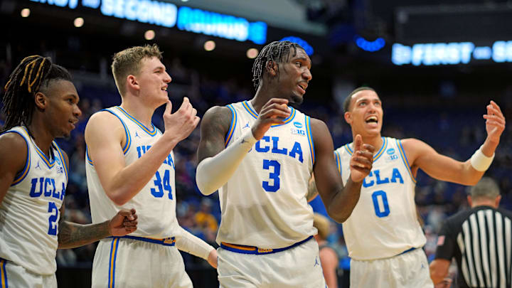 Mar 20, 2025; Lexington, KY, USA;  UCLA Bruins guard Eric Dailey Jr. (3) reacts during the second half against the Utah State Aggies in the first round of the NCAA Tournament at Rupp Arena. Mandatory Credit: Aaron Doster-Imagn Images
