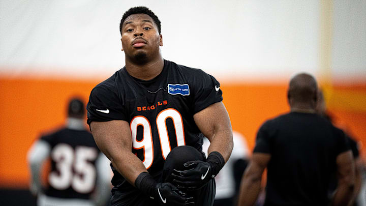 Cincinnati Bengals defensive tackle Kris Jenkins Jr. (90) stretches at Bengals spring practice at the IEL Indoor Facility in Cincinnati on Thursday, June 13, 2024.