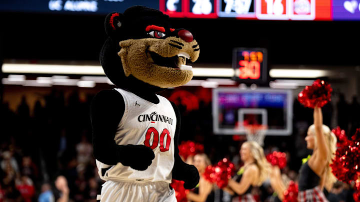Cincinnati Bearcats mascot walks on the court during a timeout in the first half of a basketball scrimmage between Cincinnati Bearcats and Ohio State Buckeyes at Fifth Third Arena in Cincinnati on Friday, Oct. 18, 2024. Cincinnati Bearcats mascot walks on the court during a timeout in the first half of a basketball scrimmage between Cincinnati Bearcats and Ohio State Buckeyes at Fifth Third Arena in Cincinnati on Friday, Oct. 18, 2024.