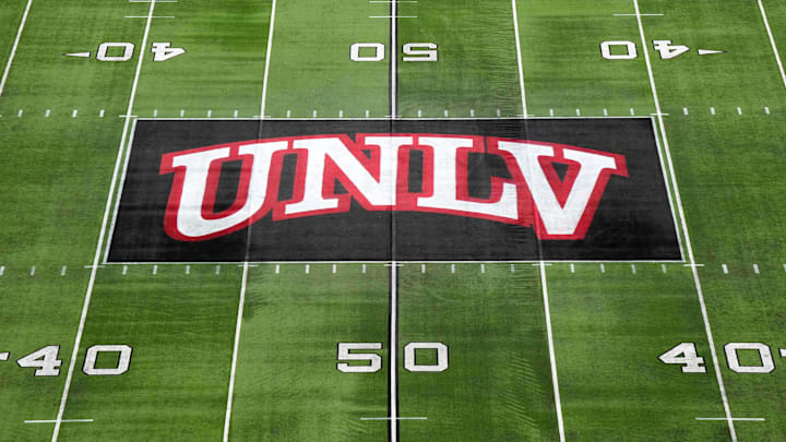 The UNLV Rebels logo at midfield during the Mountain West Championship at Allegiant Stadium. Mandatory Credit: Kirby Lee-Imagn Images