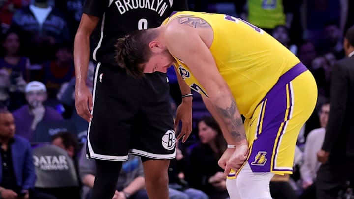 Mar 10, 2025; Brooklyn, New York, USA: Los Angeles Lakers guard Luka Doncic (77) reacts in front of Brooklyn Nets forward Ziaire Williams (8) during the fourth quarter at Barclays Center. Mandatory Credit: Brad Penner-Imagn Images Mar 10, 2025; Brooklyn, New York, USA: Los Angeles Lakers guard Luka Doncic (77) reacts in front of Brooklyn Nets forward Ziaire Williams (8) during the fourth quarter at Barclays Center. Mandatory Credit: Brad Penner-Imagn Images