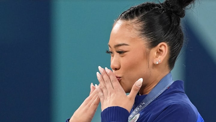 Sunisa Lee of the United States celebrates her bronze medal in the during the Paris 2024 Olympic Summer Games.