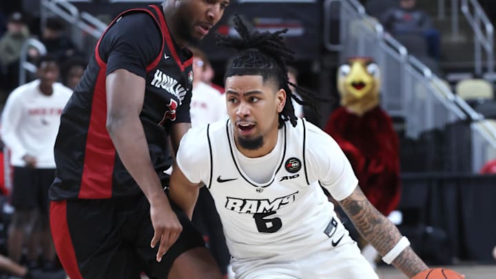 VCU guard Terrence Hill Jr. drives to the basket during the Atlantic 10 tournament. The Rams are on the bubble heading into the title game.