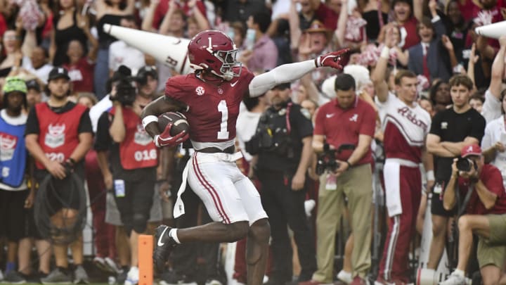 Aug 31, 2024; Tuscaloosa, Alabama, USA;  Alabama Crimson Tide wide receiver Kendrick Law (1) celebrates after scoring a touchdown against the Western Kentucky Hilltoppers during the first half at Bryant-Denny Stadium.  Mandatory Credit: Gary Cosby Jr.-USA TODAY Sports