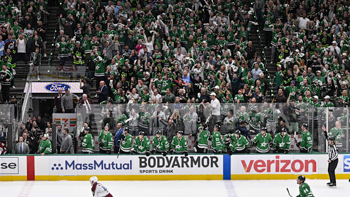 May 3, 2025; Dallas, Texas, USA; The Dallas Stars fans and team bench celebrate as right wing Mikko Rantanen (not pictured) scores an empty net goal against the Colorado Avalanche for a hat trick during the third period in game seven of the first round of the 2025 Stanley Cup Playoffs at American Airlines Center. Mandatory Credit: Jerome Miron-Imagn Images