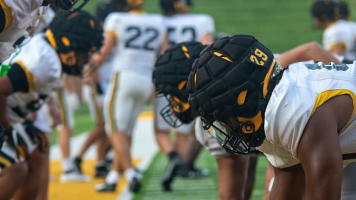 Aug 17, 2024; Columbia, Missouri, USA; Offensive and defensive linemen warm up at the Missouri Tigers annual fan night practice at Faurot Field at Memorial Stadium. Aug 17, 2024; Columbia, Missouri, USA; Offensive and defensive linemen warm up at the Missouri Tigers annual fan night practice at Faurot Field at Memorial Stadium.