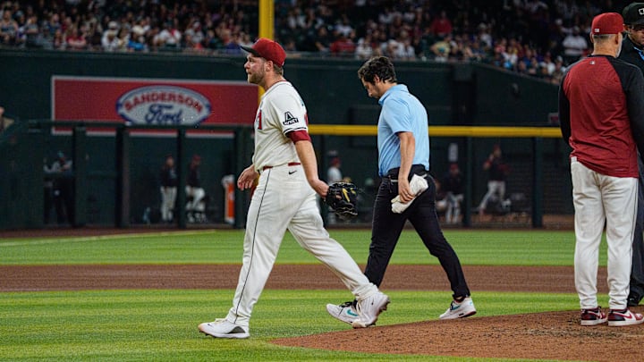 Jun 1, 2025; Phoenix, Arizona, USA; Arizona Diamondbacks starting pitcher Corbin Burnes (39) reacts after an injury in the fith inning and leaves the field against the Washington Nationals at Chase Field. Mandatory Credit: Allan Henry-Imagn Images Jun 1, 2025; Phoenix, Arizona, USA; Arizona Diamondbacks starting pitcher Corbin Burnes (39) reacts after an injury in the fith inning and leaves the field against the Washington Nationals at Chase Field. Mandatory Credit: Allan Henry-Imagn Images