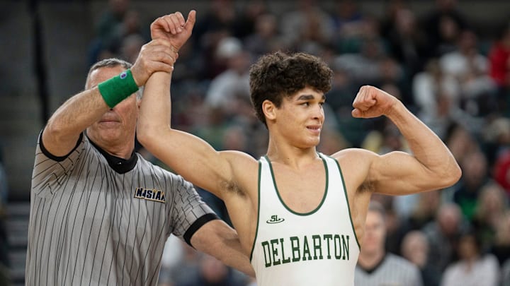 Delbarton’s Jayden James’s hand is raised after he won the 150-pound title at the 2025 NJSIAA wrestling state championships in Atlantic City.  