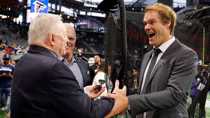 ATLANTA, GEORGIA - NOVEMBER 03: Jerry Jones, owner of the Dallas Cowboys, speaks to Greg Olsen, sports commentator, prior to the game against the Atlanta Falcons at Mercedes-Benz Stadium on November 03, 2024 in Atlanta, Georgia.