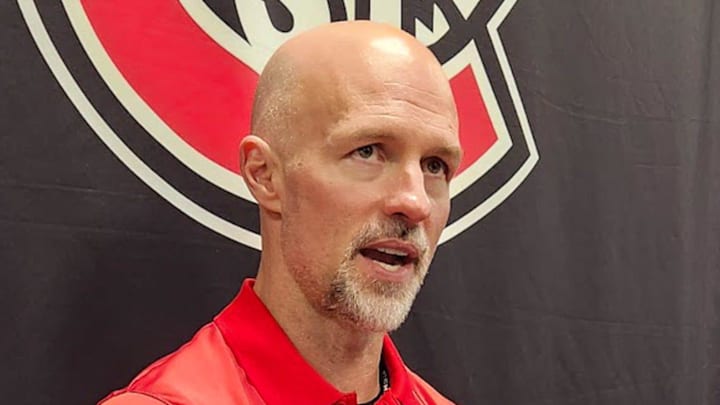St. Cloud State hockey coach Brett Larson speaks September 13 at the National Collegiate Hockey Conference media day at the Xcel Center in St. Paul.