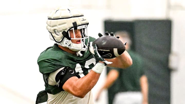 Michigan State's Jack Velling catches a pass during camp on Monday, Aug. 5, 2024, at the indoor practice facility in East Lansing. Michigan State's Jack Velling catches a pass during camp on Monday, Aug. 5, 2024, at the indoor practice facility in East Lansing.