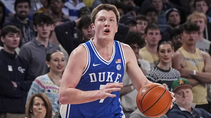Dec 21, 2024; Atlanta, Georgia, USA; Duke Blue Devils guard Kon Knueppel (7) drives th ball towards the basket against the Georgia Tech Yellow Jackets during the first half at McCamish Pavilion. Mandatory Credit: Dale Zanine-Imagn Images