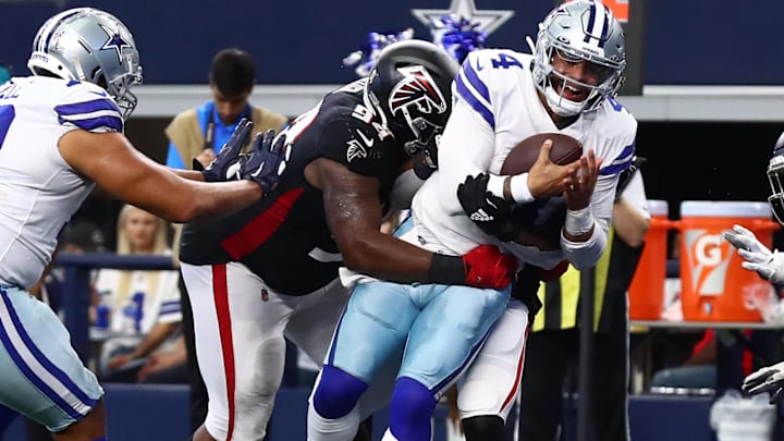 Dallas Cowboys quarterback Dak Prescott scores a third-quarter touchdown against Atlanta Falcons.
