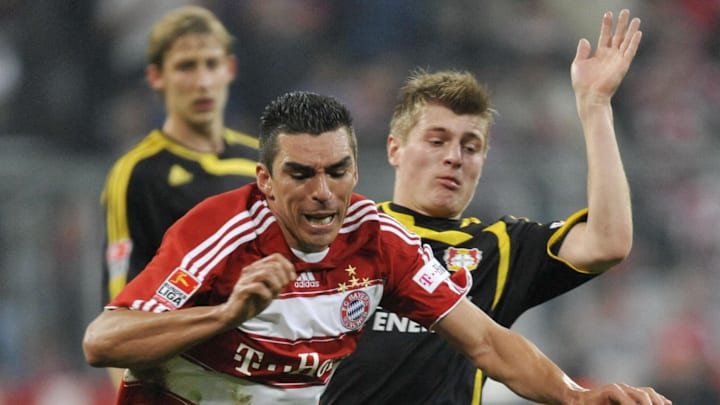 Lucio im Duell gegen Toni Kroos