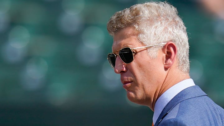 Jul 27, 2022; Baltimore, Maryland, USA; Baltimore Orioles general manager Mike Elias stands oil the field before the game against the Tampa Bay Rays  at Oriole Park at Camden Yards.