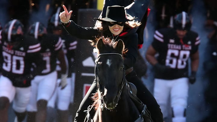 Nov 30, 2024; Lubbock, Texas, USA;  The Texas Tech Red Raiders masked rider enters the field before a game between the West Virginia Mountaineers and the Texas Tech Red Raiders at Jones AT&T Stadium and Cody Campbell Field. Mandatory Credit: Michael C. Johnson-Imagn Images